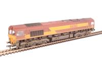 Class 66 66065 in EWS livery with DB Schenker branding - weathered