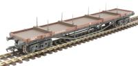 30 ton bogie bolster wagon in BR bauxite with steel load - weathered