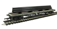 30 ton bogie bolster B943860 in BR grey with Steel Pipes