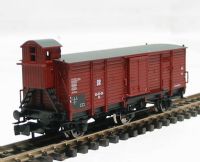 8731 Class Gh 3axle covered goods wagon with brakemans cabin of the German DR in brown livery Epoch III 