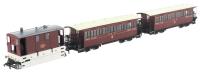 Class J70 0-6-0 steam tram 125 in GER crimson with two Wisbech and Upwell third class bogie tramcars - post 1919 condition
