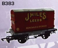 Conflat wagon in North Eastern grey with container "J. Miles"