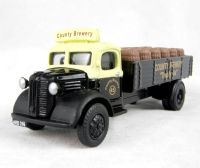 EM76309 Austin K2 dropside with barrel load in "County Brewery" livery