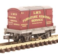 4 wheel conflat wagon in LMS grey with 'Furniture removal' container