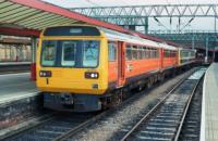 Class 142 'Pacer' 2-car DMU 142013 in Greater Manchester PTE orange - "Blackpool North / Manchester Victoria"