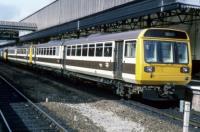 Class 142 'Pacer' 2-car DMU 142020 in 'Skipper' Chocolate and Cream - "Barnstaple / Exeter"