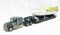 US55709 Kenworth W925 truck with lowboy trailer and boat load