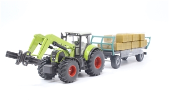 Claas Tractor with bale grabber & trolley