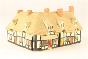 Tudor style thatched house