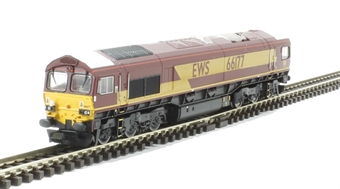 Class 66 66177 in EWS maroon & gold with experimental white roof