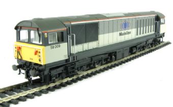 Class 58 58009 in Railfreight sector grey with "Mainline" branding