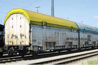 Class Hccrrss set car transporter of the Hungarian GySEV in "Car Rail Logistics" yellow & blue livery Epoch V 