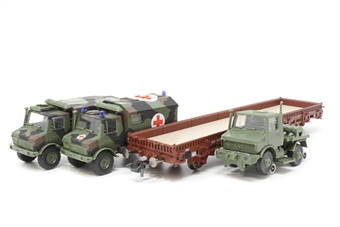 Stake wagon of the DB with Unimog ambulance load