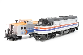 EMD F40PH 229 & Caboose 852 in Amtrak livery