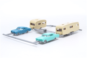 2 Cars towing caravans