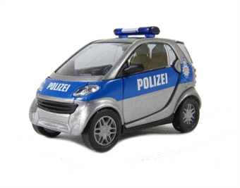 Smart Polizei police car in silver & blue HO gauge