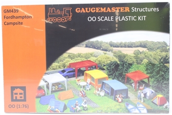 Campsite kit with tents, chairs and camping equipment