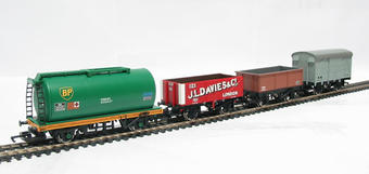 Wagons, "BP" tank, steel mineral, 7-plank "J.L. Davies & Co." and a BR grey ventilated van (unboxed) - Pack of 4