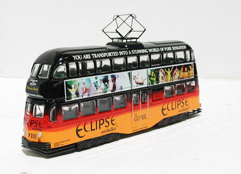 Blackpool Balloon d/deck tram No.704 in "Eclipse" black/red/yellow Ad. livery