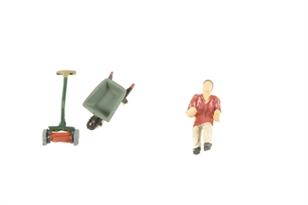 Gardener with wheelbarrow and grass mower