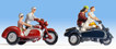 2 motorbikes with sidecars and passengers