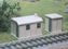 Pair of concrete lineside huts - plastic kit