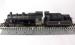 Class 2MT Ivatt 2-6-0 46440 in BR black with early emblem
