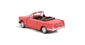 Triumph Vitesse convertible in racing red, hood down with opening bonnet