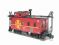 Long steel Caboose van in red Santa Fe livery